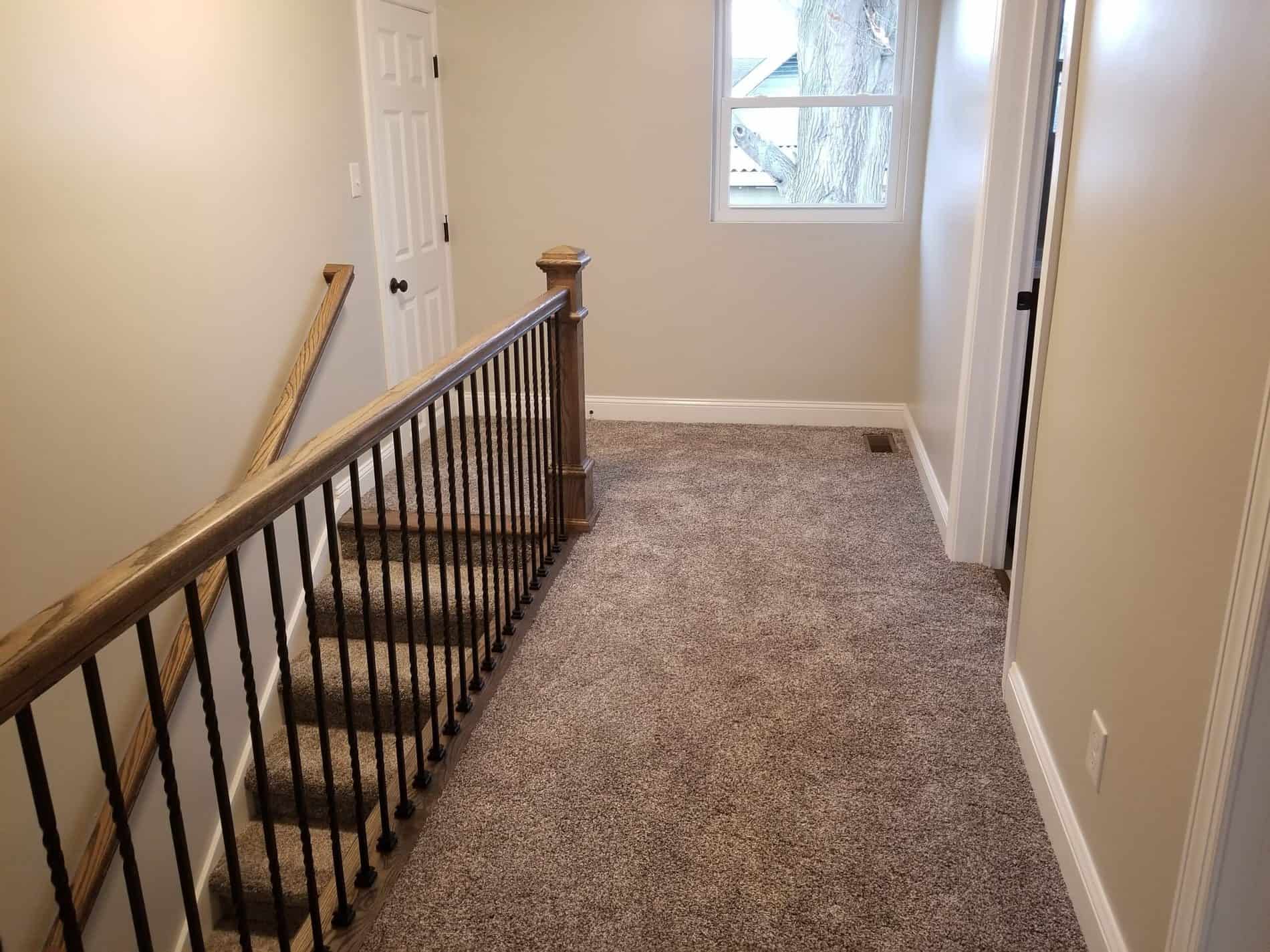 Home Remodel with hallway leading to main floor