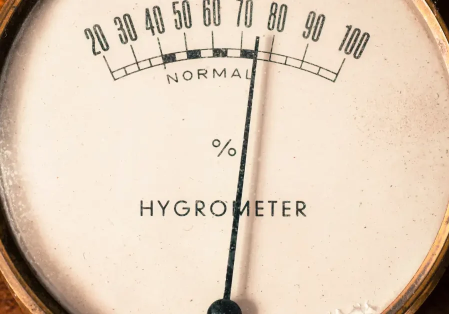 Analog hygrometer needle at 70 percent
