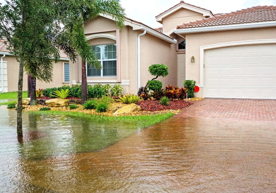 Water surrounds home after heavy rain.