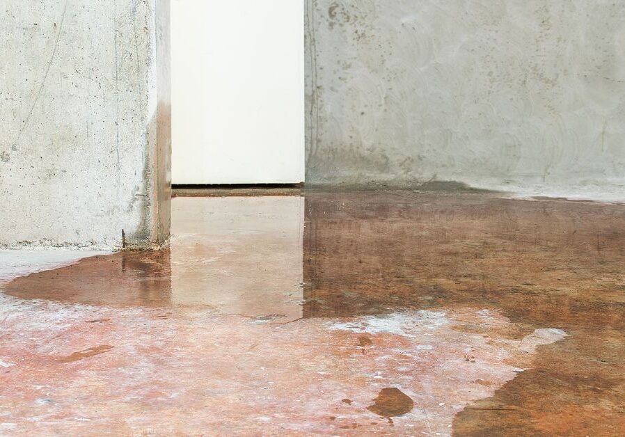 Wet concrete floor indoors